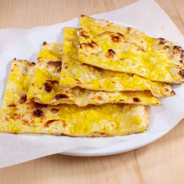 Garlic Naan — Everest Masala Indian Cuisine Montréal